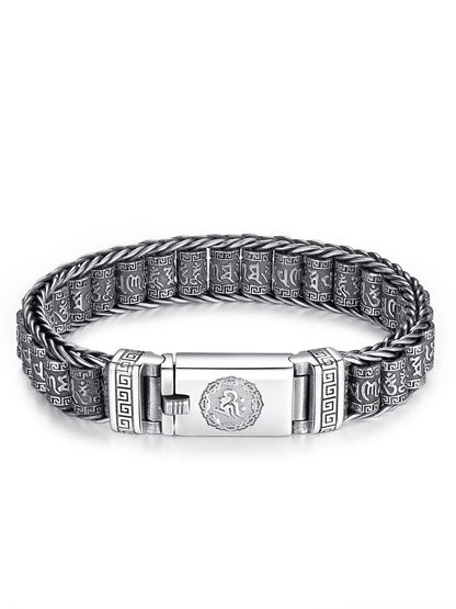Armbånd med seks tegn som symboliserer sannhetens bønnehjul