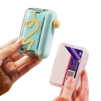 Automatisk popup-dispenser for tanntråd