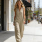 🌞Spring Awakening: 49 % rabatt! Elegant jumpsuit med V-hals: Ermeløs jumpsuit med knappestolpe i en avslappet passform