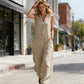 🌞Spring Awakening: 49 % rabatt! Elegant jumpsuit med V-hals: Ermeløs jumpsuit med knappestolpe i en avslappet passform