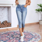 Stretchiga caprijeans för damer med dragsko i midja