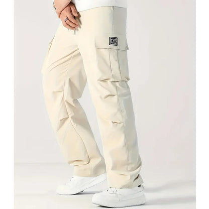 👖 48 % RABATT NÅ! 🛠️ Herre stretchbukser med lommer – Flere lommer og snøring i midjen – Avslappede bukser med rette ben – Ideelle for jobb, reise eller aktive dager 🏃‍♂️